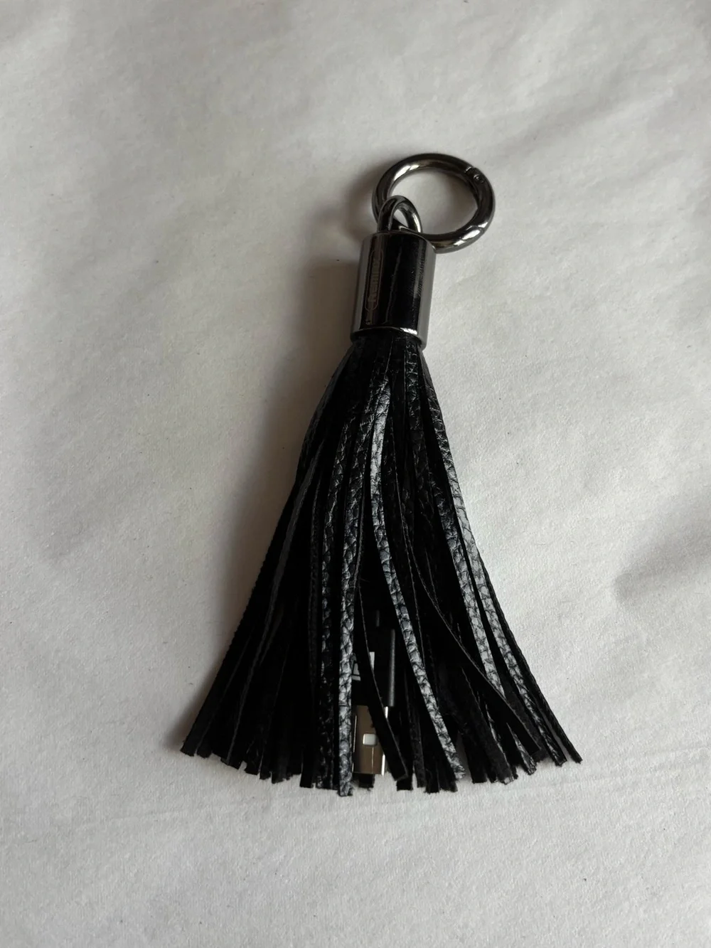 Remax faux leather black tassel USB A lightning cord charging adapter keychain